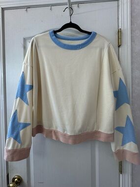 Cream Pullover with Blue Star Sleeves